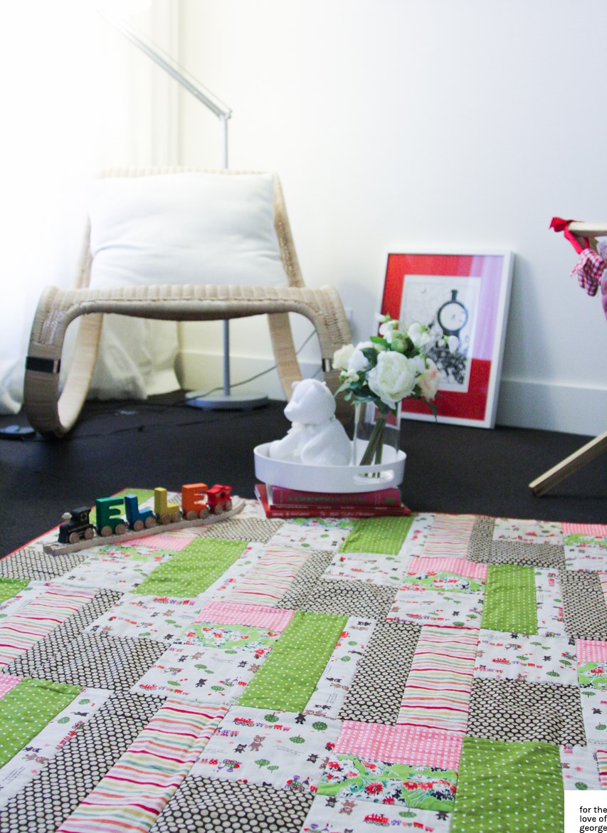 Pink, green, red and brown 'little trains' gender neutral cot quilt on For the Love of George