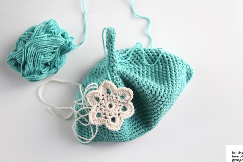 For the Love of George - Aqua baby beanie in progress, from Paton's Retro Babes pattern book.